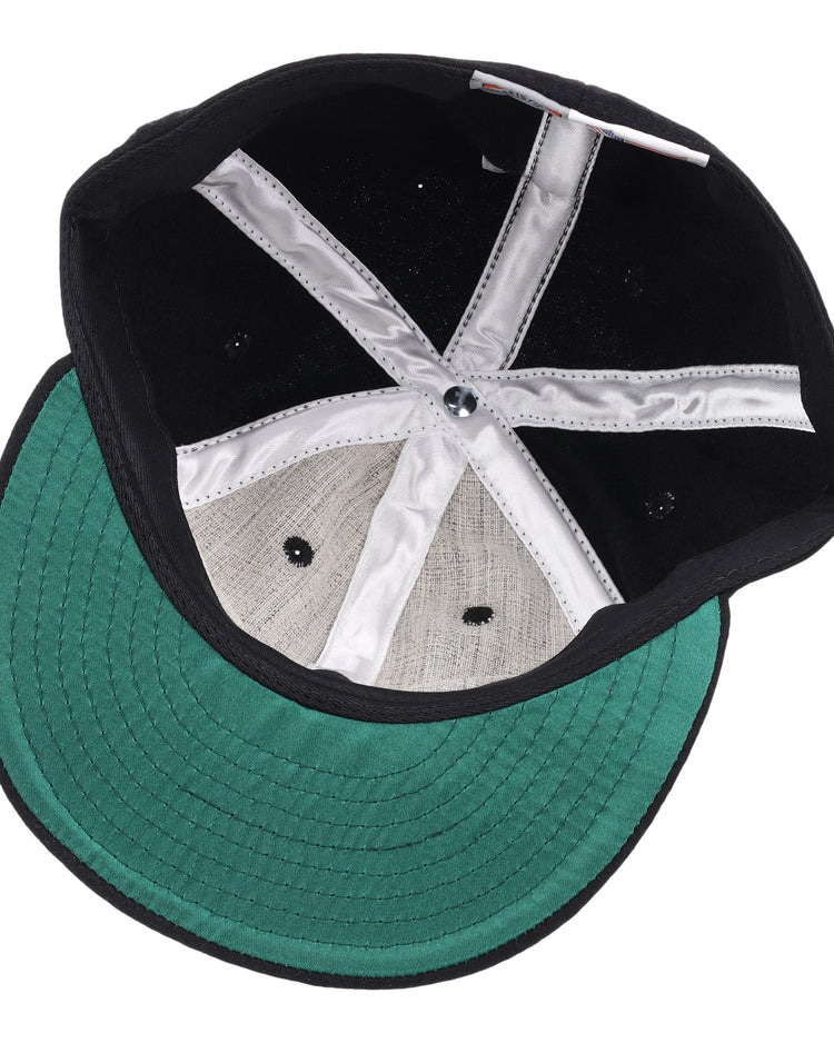 The image shows the inside of an EFF Salt Lake City Bees Vintage Ballcap, featuring a green brim underside, white stitched panels, and a top button—capturing classic baseball style.