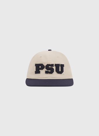 A Penn State Chenille Logo Cotton Twill Ballcap by Ebbets Field, featuring a beige crown with a dark brim and large black chenille “PSU” letters stitched on the front, made from durable cotton twill and shown against a plain white background.