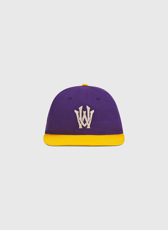 The Ebbets Field University of Washington Cotton Twill Classic Cap features a purple crown with a yellow brim and a white “W” logo on the front, displayed against a plain light gray background.