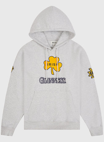 Express your Irish pride with the Notre Dame X Guinness Heavyweight Pullover Hoodie by Ebbets Field. Featuring a light gray design, this hoodie displays a bold yellow shamrock and “IRISH” above the iconic GUINNESS logo on the front. Yellow and navy logos accent the sleeves, while a front pocket and cozy hood add comfort and functionality—making this Irish heritage hoodie perfect for both style and comfort.
