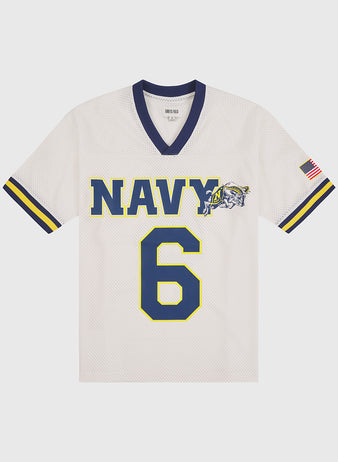 The US Naval Academy Mesh Football Jersey by Ebbets Field showcases classic white mesh fabric adorned with bold blue and yellow “NAVY” lettering, a striking bulldog mascot, number 6, and retro blue and yellow stripes on the sleeves. An American flag patch on the right sleeve enhances its authentic appeal, making this Ebbets Field Navy football jersey a must-have for any fan or collector.