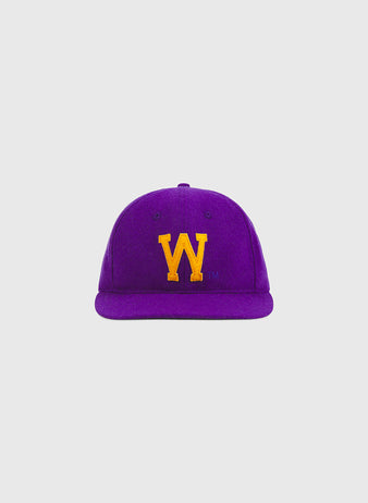 An Ebbets Field University of Washington Authentic Wool Ball Cap in purple, featuring a yellow embroidered “W” on the front and set against a plain light gray background. This classic wool cap is ideal for Huskies baseball fans and University of Washington supporters.
