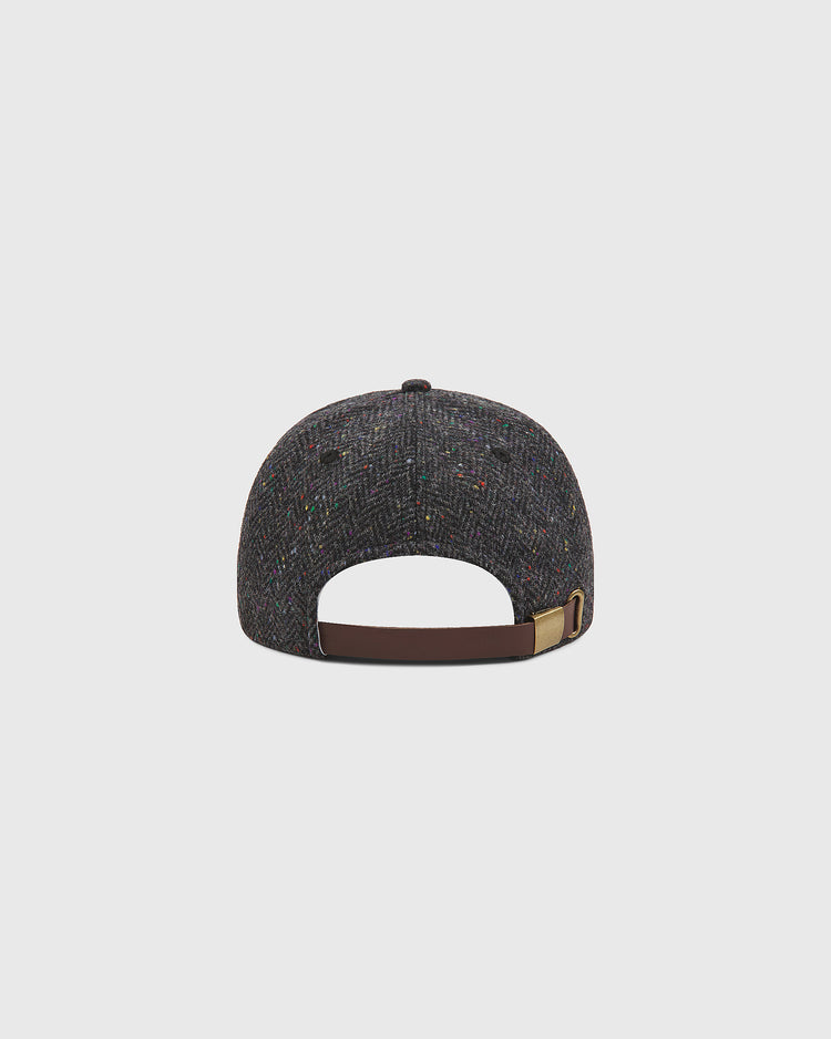 An Ebbets Field Notre Dame X Magee Irish Donegal Wool Ballcap in grey, shown from the back, featuring a brown adjustable strap with a metallic buckle.