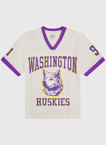 Show your Huskies pride in style with the University of Washington Mesh Football Jersey by Ebbets Field—featuring a white mesh body, striking purple trim, bold “Washington Huskies” text, a central husky graphic, and the number 91 on both sleeves in purple edged with gold—perfect for fans or anyone celebrating a classic Rose Bowl season.