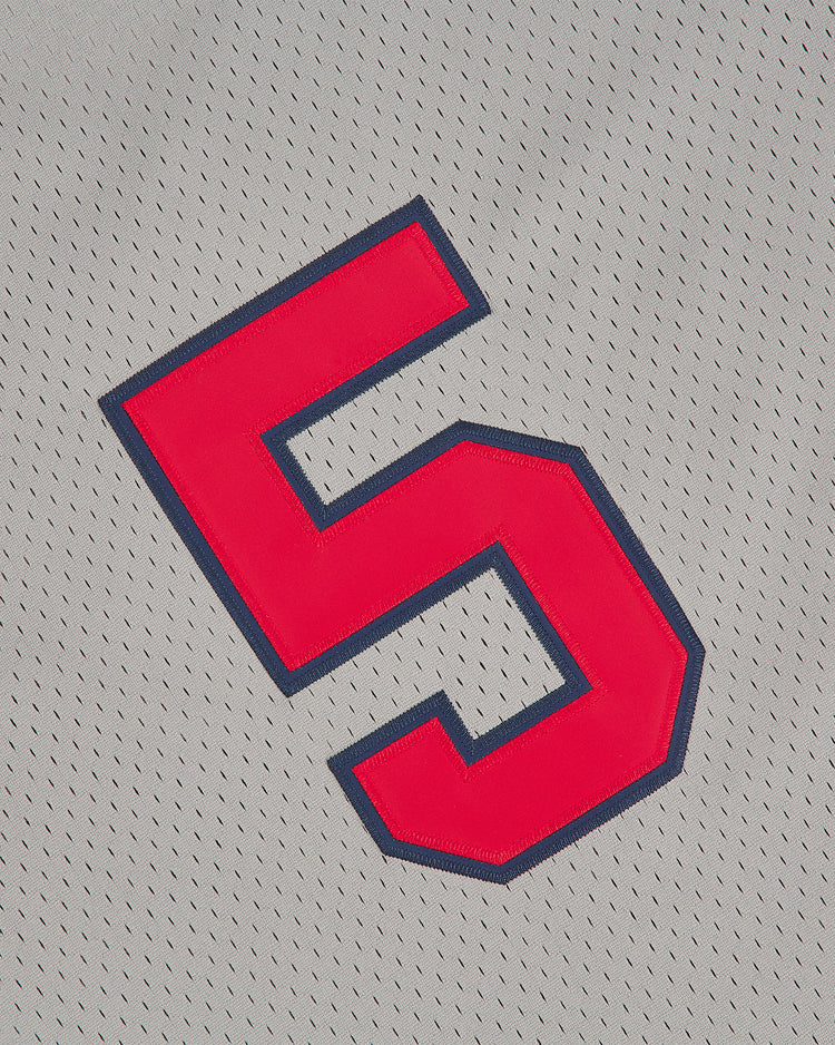 A large red number 5 outlined in blue is displayed on the light gray, perforated mesh fabric of the Ebbets Field Los Angeles (PCL) 1942 Mesh Button Up Road Jersey.