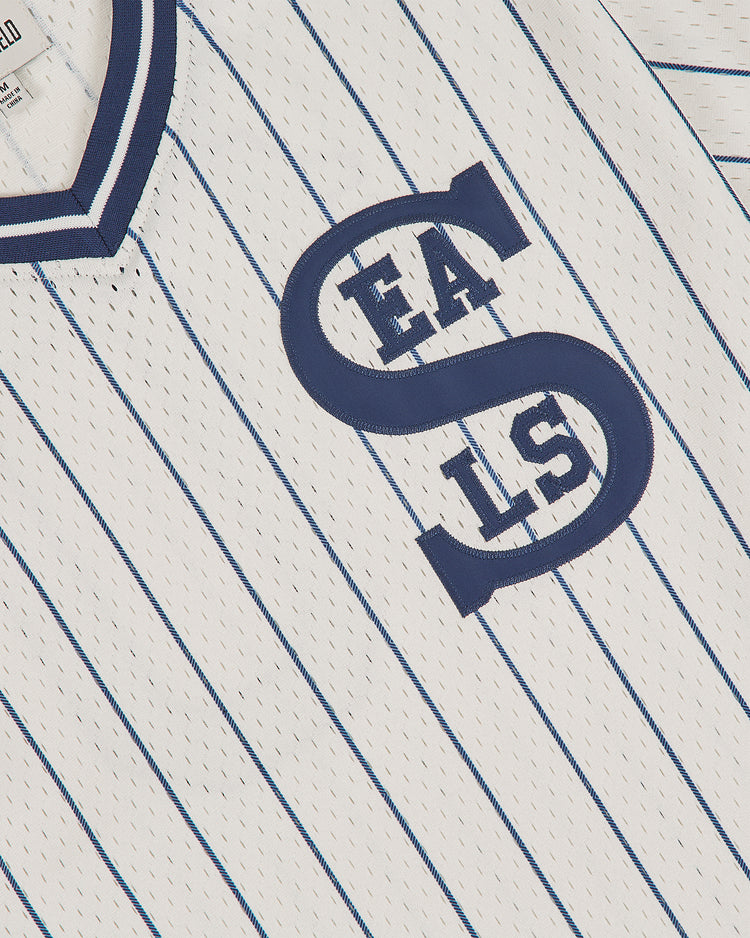 The Ebbets Field San Francisco Seals 1933 Mesh V-Neck Home Jersey features white pinstripes with navy trim on the collar. The front displays two large navy “S”s overlapping the navy “EALS” lettering, and the breathable fabric is detailed with small perforations.