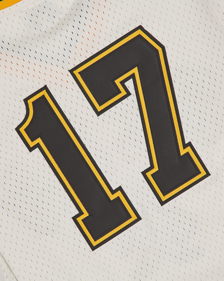 A close-up of the Ebbets Field Salt Lake City Bees 1959 Mesh V-Neck Home Jersey, showcasing bold black number 17 outlined in yellow on breathable white mesh fabric with small perforated holes, inspired by classic 1959 baseball jerseys.