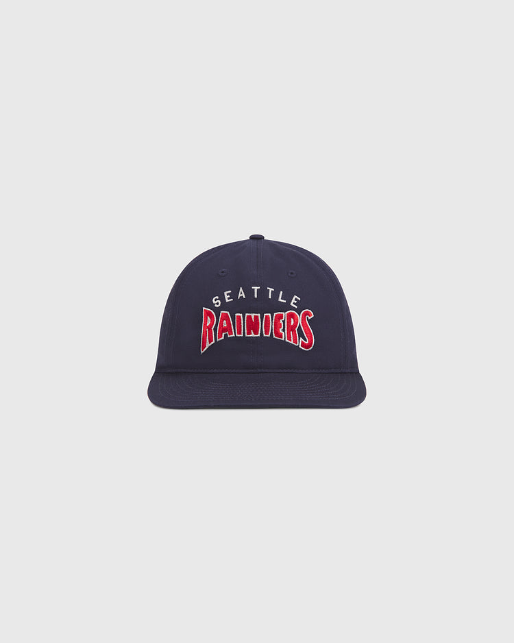 The Ebbets Field Seattle Rainiers 1941 Cotton Twill Ballcap features navy blue cotton twill with “Seattle Rainiers” embroidered in white and red on the front, inspired by the iconic 1941 Pacific Coast League team, and is displayed against a simple light gray background.