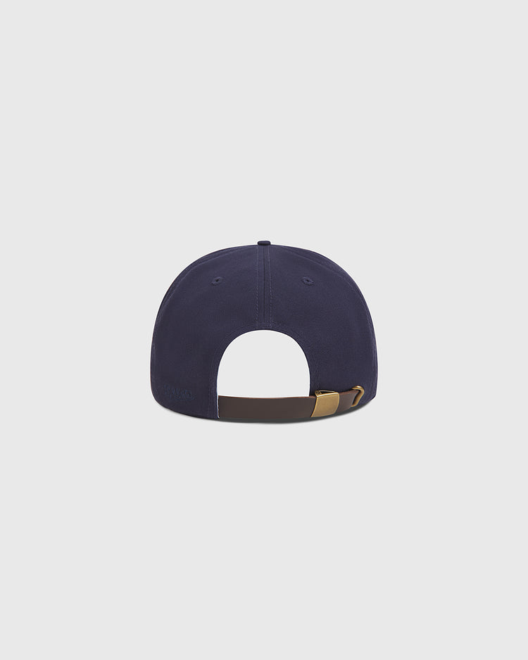 The Ebbets Field Seattle Rainiers 1941 Cotton Twill Ballcap is shown from the back in navy blue, featuring a brown adjustable strap with a gold buckle and set against a plain light gray background—a tribute to the classic heritage of the 1941 Pacific Coast League.
