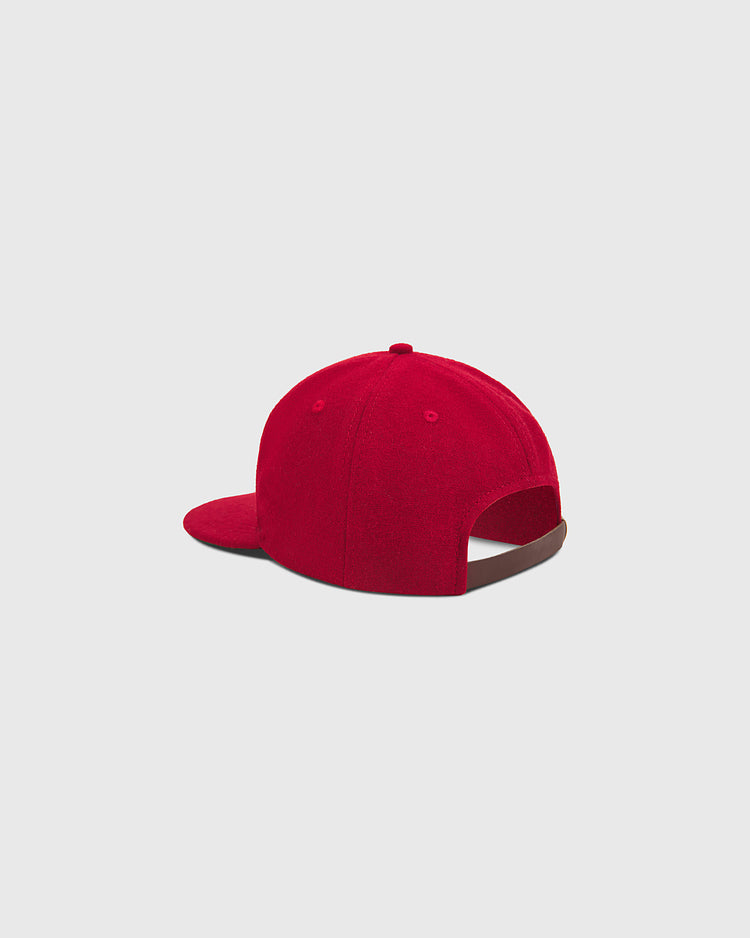 The Ebbets Field Seattle City Series Wool Ballcap, crafted from genuine wool broadcloth, is displayed from the back against a plain light gray background. The red cap features a curved brim and an opening above the adjustable strap area, reflecting classic city series hat style.