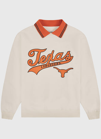 The University of Texas Collared Crewneck by Ebbets Field is a cream long-sleeve shirt featuring an orange collar and bold “Texas Longhorns” lettering with a longhorn logo printed in orange on the front.
