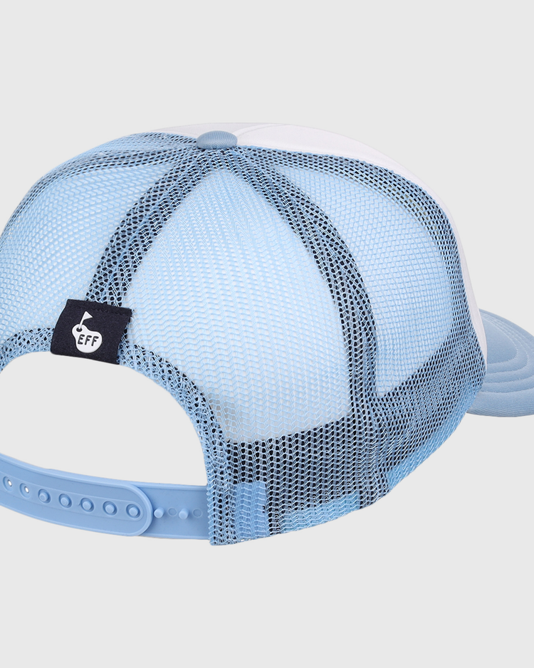 The EFF Bogey Boys x EFF Trucker hat is light blue and white with a mesh back, adjustable snapback, and a small black thumbs-up tag—ideal for golf.