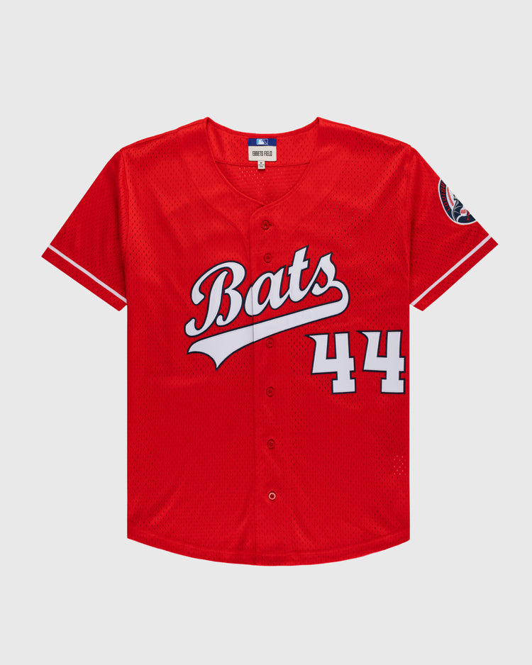 The Ebbets Field ELLY DE LA CRUZ BUTTON UP MESH JERSEY in red features white trim, Bats script and number 44 on the front, a circular left sleeve patch, and a button-down front.