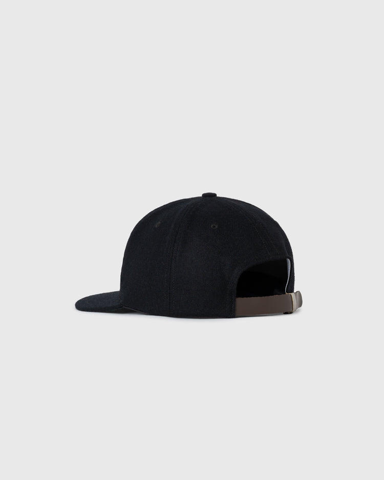The EFF Cal State Long Beach 1961 Authentic Wool Ballcap is displayed from the back and side, showing its black color, curved brim, and adjustable brown strap with metallic buckle against a plain light gray background.