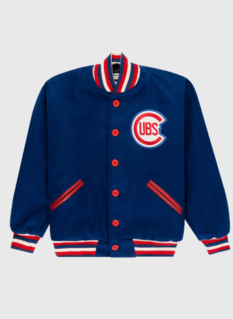 The EFF Chicago Cubs 1954 Authentic All Wool Varsity Jacket is blue with red buttons, red and white striped collar, cuffs, and hem, plus a Cubs logo patch on the left chest.