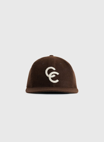 The EFF Cordoba Cafeteros 1957 Authentic Wool Ballcap is a brown hat with a white overlapping CC logo, inspired by Mexican baseball history and shown on a plain white background.