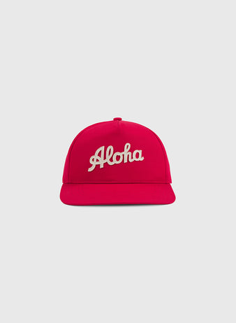 The Ebbets Field Aloha 100th Infantry 1942 A-Frame Cotton Twill Ballcap in bright pink features “Aloha” embroidered in white cursive on the front, shown against a plain light gray background.