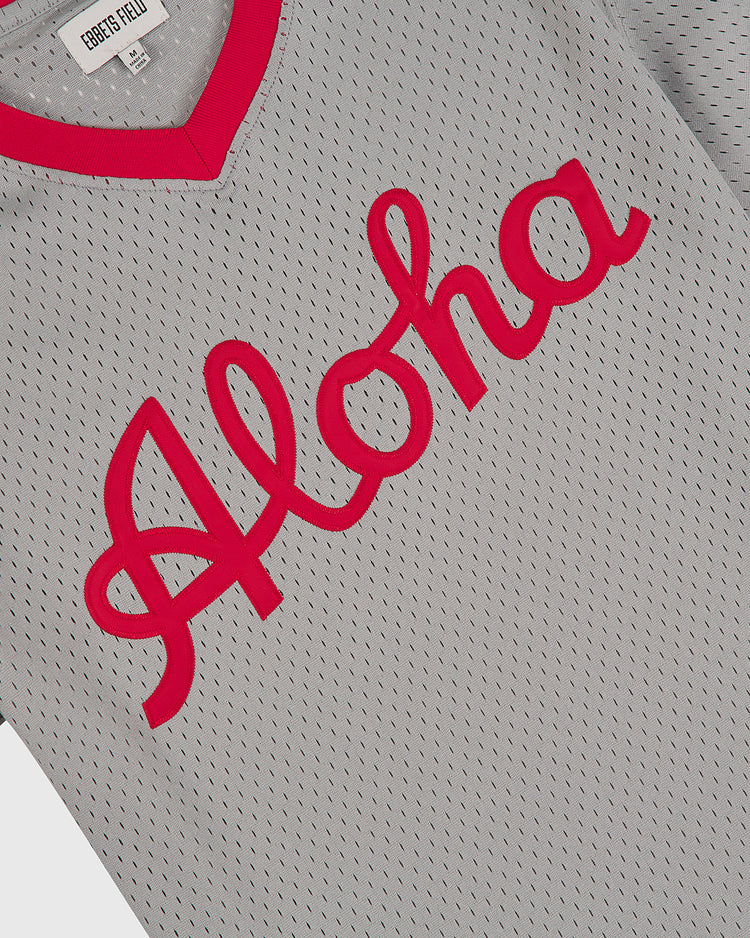 The Ebbets Field Aloha 100th Infantry 1942 Mesh V-Neck Jersey is a gray mesh jersey with a red collar and 