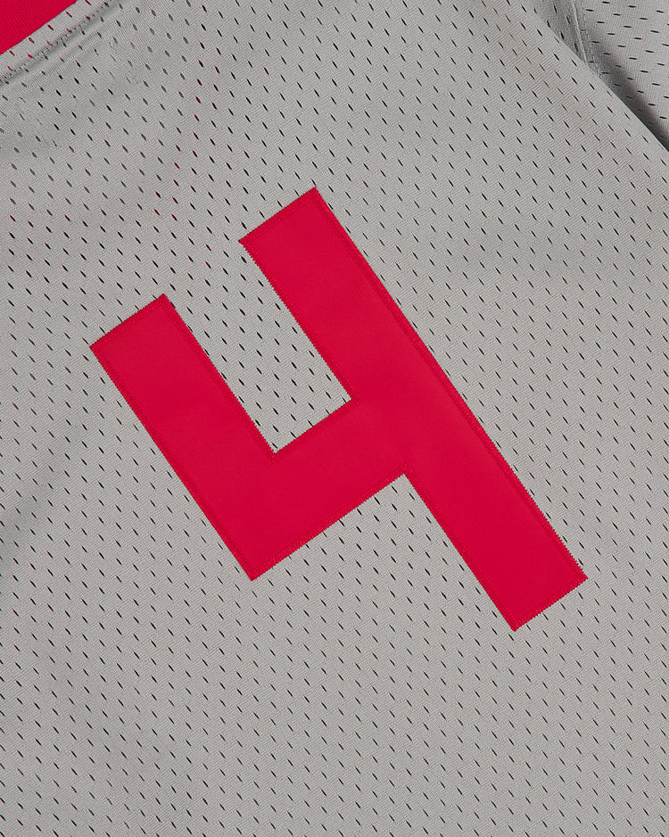 Close-up of the Ebbets Field Aloha 100th Infantry 1942 Mesh V-Neck Jersey in gray, featuring a bold red number 4—an homage to Japanese-American baseball heritage.