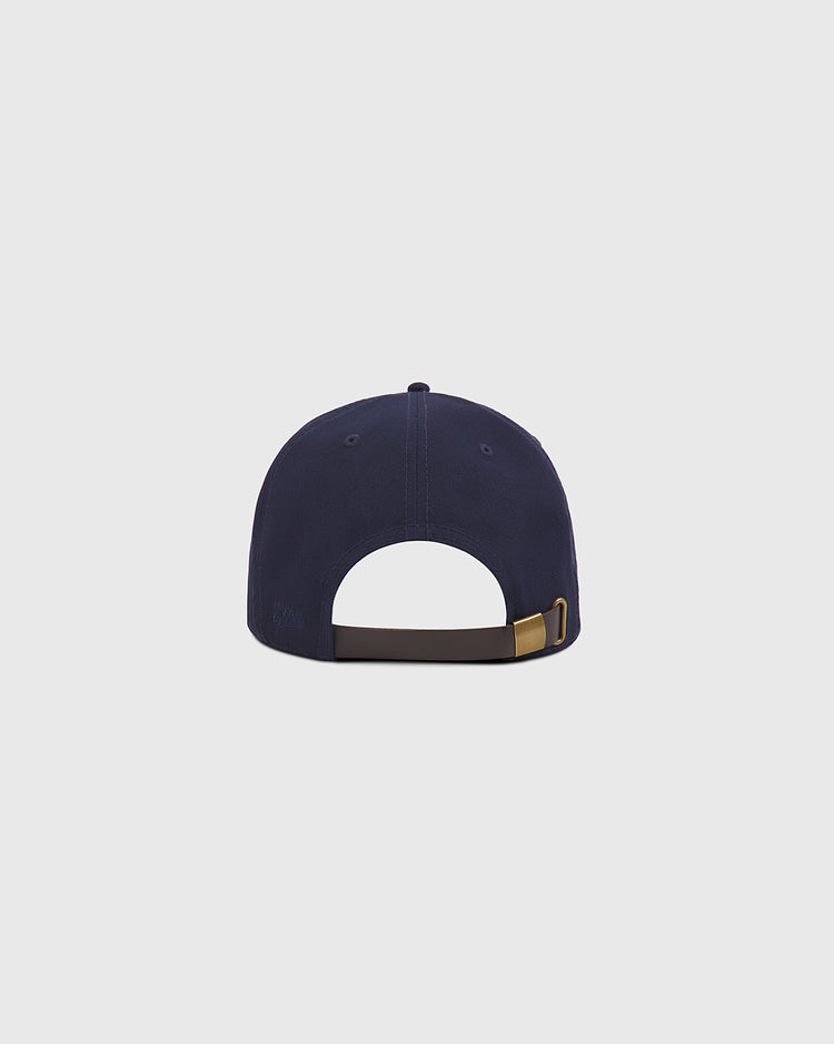 The Ebbets Field Aloha 100th Infantry 1942 Cotton Twill Ballcap is shown from the back, highlighting its brown adjustable strap with a brass buckle against a plain light gray background.