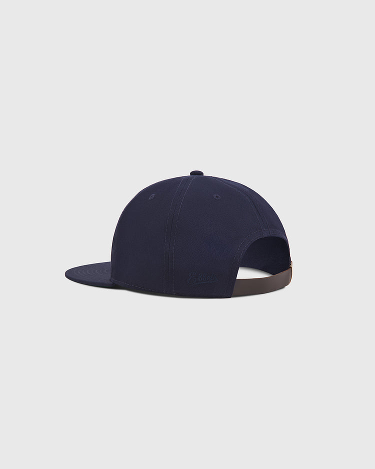 The Ebbets Field Aloha 100th Infantry 1942 Cotton Twill Ballcap is shown from the back and side with a curved brim, adjustable strap, and plain light gray background.