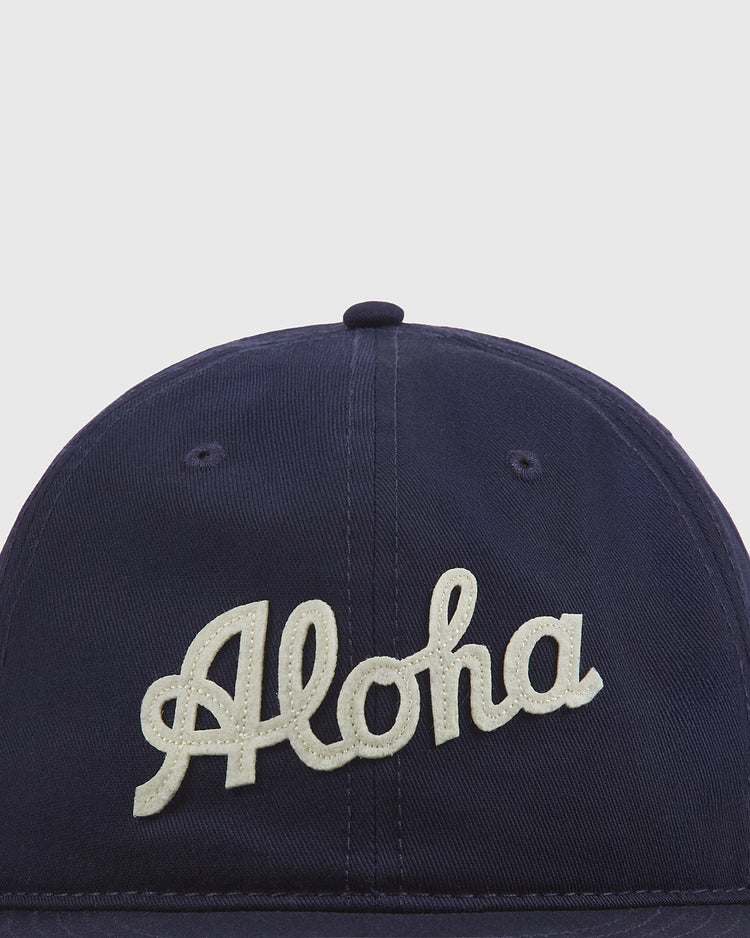 The Ebbets Field Aloha 100th Infantry 1942 Cotton Twill Ballcap is a navy blue cap featuring 