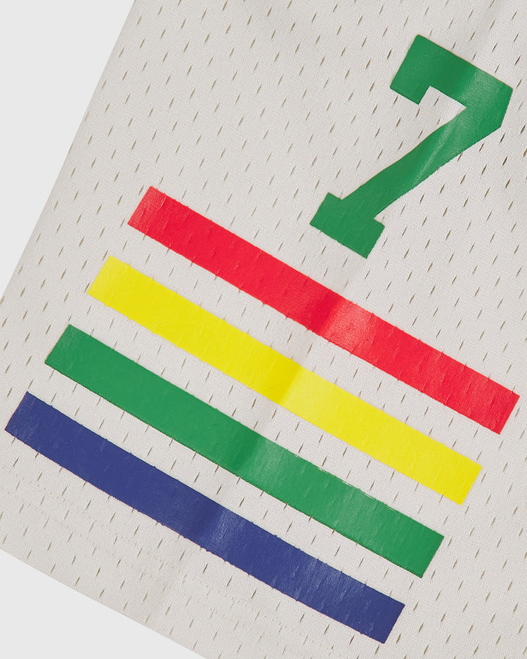 The Ebbets Field University of Hawaii Rainbow Warriors Mesh Football Jersey features white mesh with perforations, a green number 7, and four horizontal stripes—red, yellow, green, and blue—honoring the classic Rainbow Warriors style.
