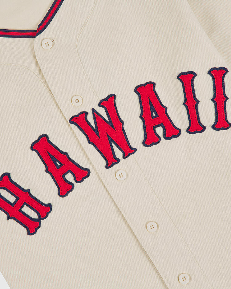 The Ebbets Field Hawaii Islanders (PCL) 1964 Cotton Twill Baseball Jersey features cream cotton twill, red and navy trim, and bold “HAWAII” lettering, capturing classic Pacific Coast League style.