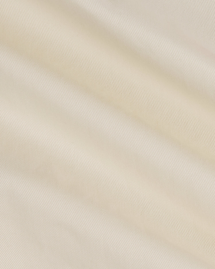 Close-up of the Ebbets Field Hawaii Islanders (PCL) 1964 Cotton Twill Baseball Jersey, featuring smooth light beige cotton twill with a subtle diagonal weave pattern and gentle folds.