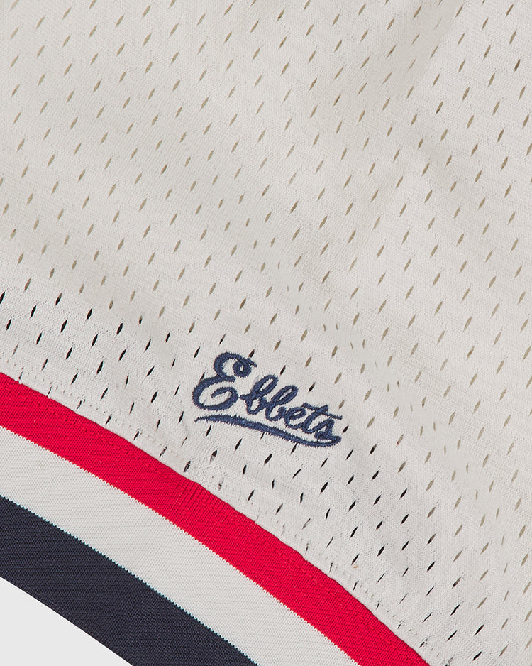 A close-up of the Hawaii Islanders (PCL) 1974 Mesh V-Neck Jersey by Ebbets Field, showing white mesh fabric with small perforations and 