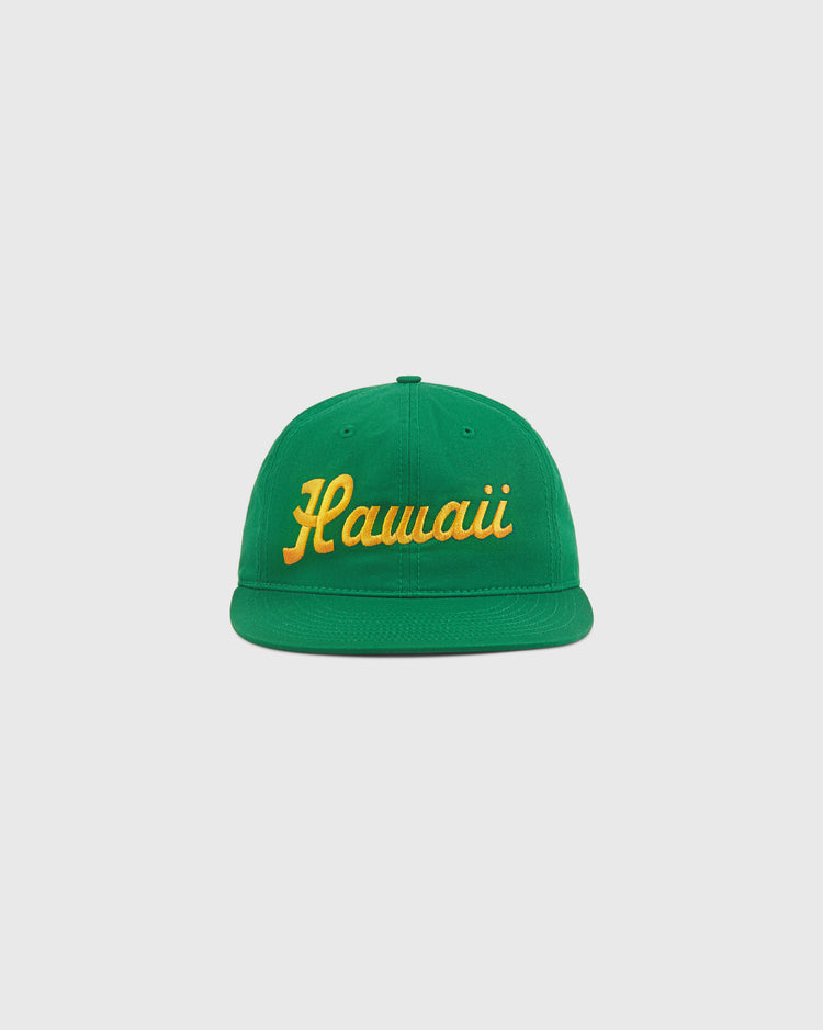 The Ebbets Field Hawaii Islanders (PCL) 1961 Logo Script Cotton Twill Ballcap features “Hawaii” in yellow cursive on green cotton twill, shown against a plain white background.