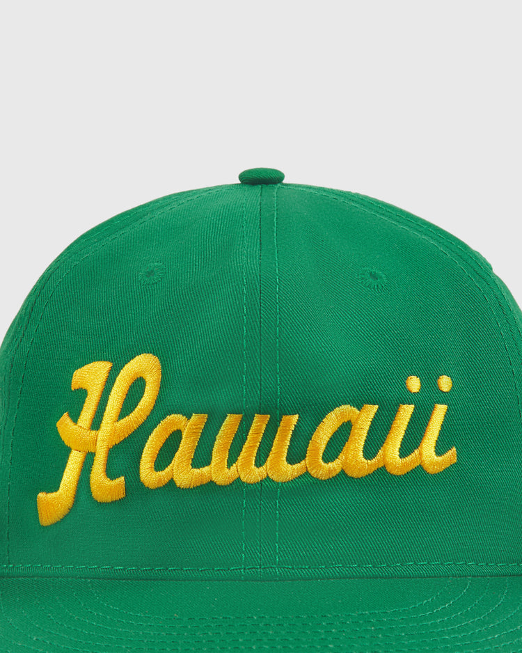 The Ebbets Field Hawaii Islanders (PCL) 1961 Logo Script Cotton Twill Ballcap is a green vintage-style hat with 