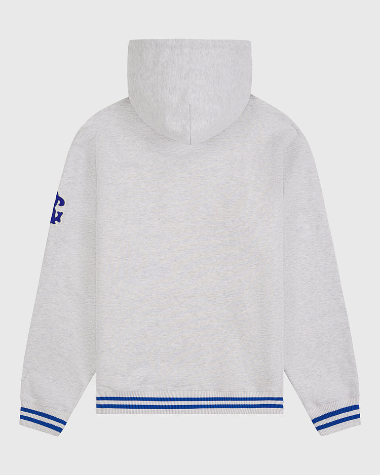Back view of the Ebbets Field Brooklyn Royal Giants Heavyweight Cotton Terry Pullover Hoodie in light gray, featuring blue and white striped cuffs and waistband. The left sleeve is adorned with a dark blue “G” near the shoulder, celebrating Black baseball history.