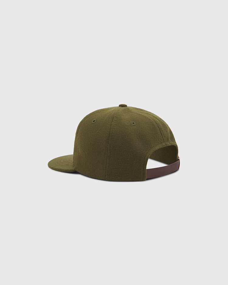The Ebbets Field Brooklyn Royal Giants Authentic Wool Ballcap is shown from the back, highlighting its olive green wool construction, flat brim, and adjustable strap with a brown accent. Drawing inspiration from Black baseball history and teams like the Brooklyn Royal Giants, the cap is displayed against a plain light gray background.