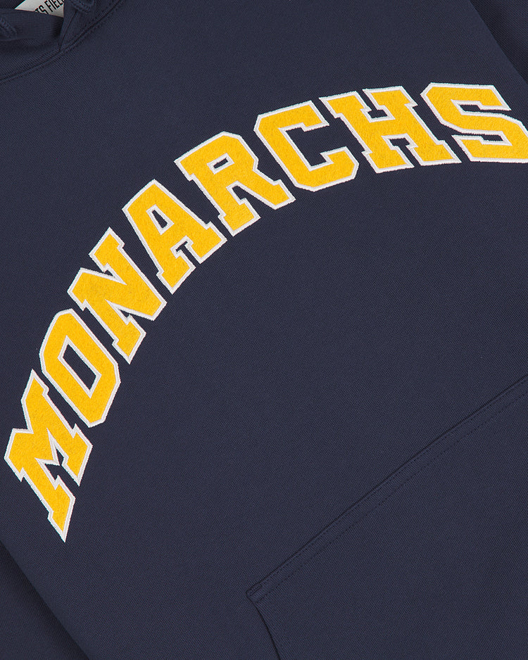 A navy blue Ebbets Field Kansas City Monarchs 1924 Road Jersey Pullover Hoodie with MONARCHS in bold yellow and white letters across the chest.