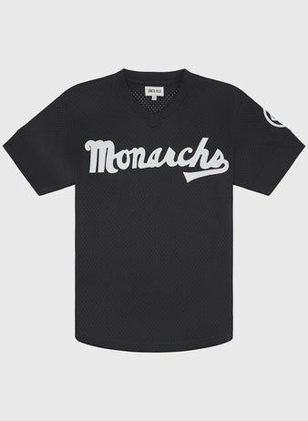 Kansas City Monarchs 1924 Road Jersey V-Neck Mesh in black featuring white script lettering across the chest and a circular team logo patch on the left sleeve.