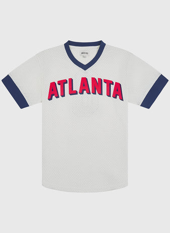 Ebbets Field Atlanta Black Crackers 1940 V-Neck Mesh Jersey in white with ATLANTA in red block lettering across the chest and navy blue trim on the collar and sleeves.