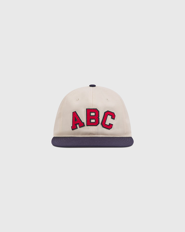 Atlanta Black Crackers 1940 Cotton Twill Ballcap in off-white cotton twill with a navy blue brim and red ABC lettering on the front.