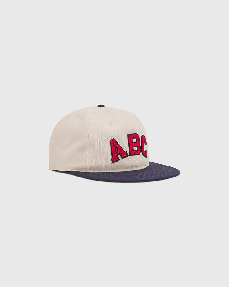 Atlanta Black Crackers 1940 Cotton Twill Ballcap in cream-colored cotton twill with a dark navy brim and red felt ABC lettering on the front.