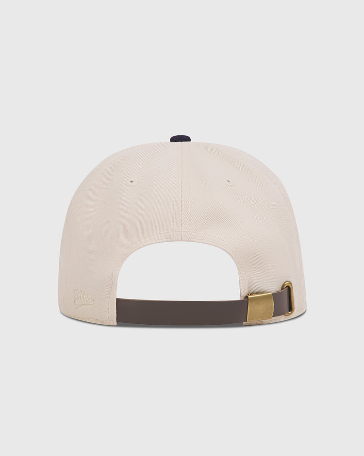 Back view of the beige cotton twill Atlanta Black Crackers 1940 Cotton Twill Ballcap by Ebbets Field, featuring a dark brown leather adjustable strap and a brass buckle.