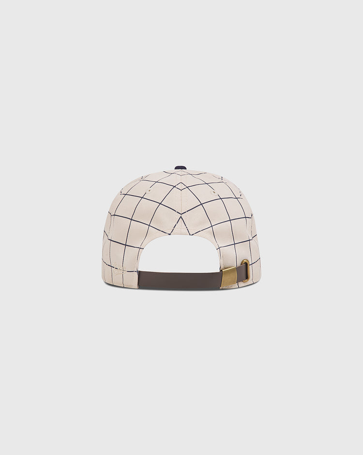 The Chicago American Giants 1919 Cotton Twill Ballcap by Ebbets Field is beige with a black grid pattern and features a dark adjustable strap with a metal buckle, shown from the back.