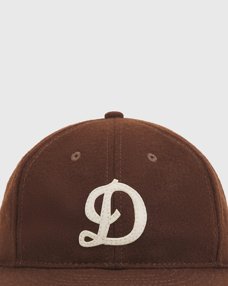 Brown wool Ebbets Field Detroit Stars 1959 Authentic Wool Ballcap featuring an embroidered cream-colored cursive D on the front.