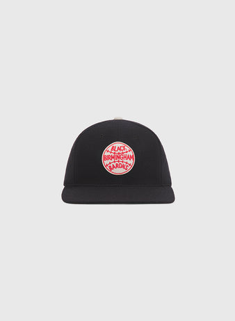 Black Birmingham Black Barons 1924 Logo Wool Ballcap featuring a circular white patch with red stitching and text reading Black Birmingham Barons.