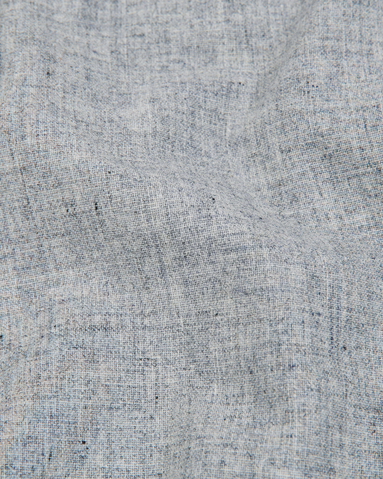 Close-up of the Ebbets Field Tokio Senators 1936 Authentic Wool Road Jersey in light gray, featuring a textured wool fabric with subtle visible weave patterns, gentle wrinkles, and a soft, natural appearance evocative of classic road jerseys.