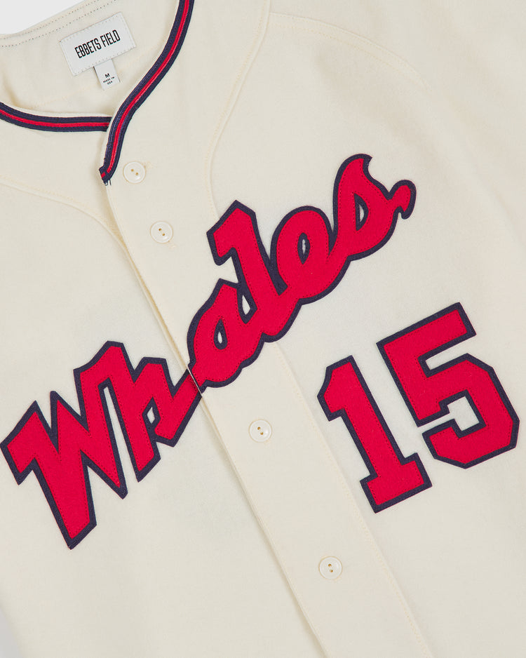 An authentic wool home jersey in cream by Ebbets Field, featuring “Whales” in red with a black outline and the number 15 on the front. Inspired by the classic 1963 Taiyo Whales jersey, this piece perfectly captures vintage Japanese baseball style.