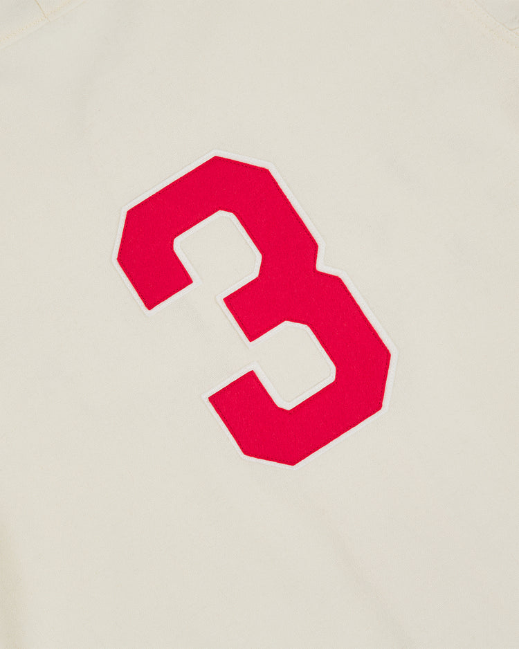 A bold red number 3 stands out against the off-white wool fabric of the Shochiku Robins 1950 Authentic Wool Home Jersey by Ebbets Field, capturing the classic style of vintage Japanese baseball uniforms.