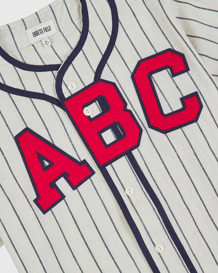An Atlanta Black Crackers 1940 Authentic Home Jersey by Ebbets Field, featuring white pinstripes, bold red “ABC” lettering on the front, and an Ebbets Field label at the collar.