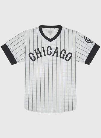 Ebbets Field Chicago American Giants 1927 V-Neck Mesh Jersey in white with pinstripes, black trim, a circular team logo on the left sleeve, and CHICAGO across the chest.