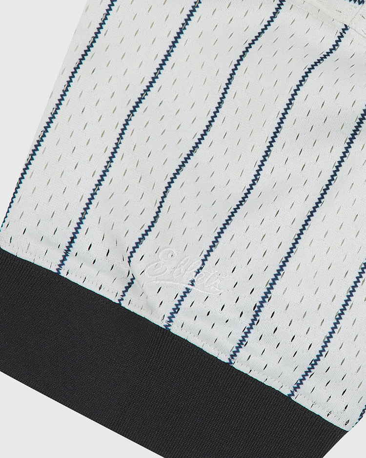 Close-up of a Chicago American Giants 1927 V-Neck Mesh Jersey, featuring white mesh with thin vertical navy blue zigzag stripes and a solid black ribbed hem.