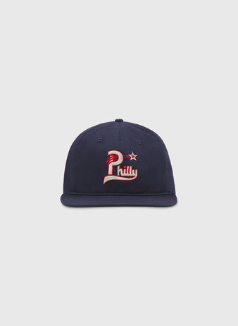 The Ebbets Field Philadelphia Stars Cotton Twill Ballcap is a navy blue baseball cap made from cotton twill, featuring a red, white, and cream Philly logo with a star on the front, reminiscent of a classic Philadelphia Stars ballcap and shown against a plain white background.